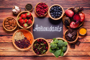 Image of healthy food surrounding the word antioxidants